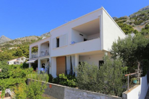 Apartments by the sea Pisak, Omis - 1008